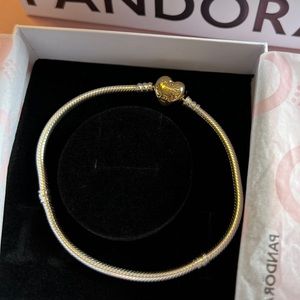 Authentic Pandora bracelet with 14 kt gold plated heart clasp